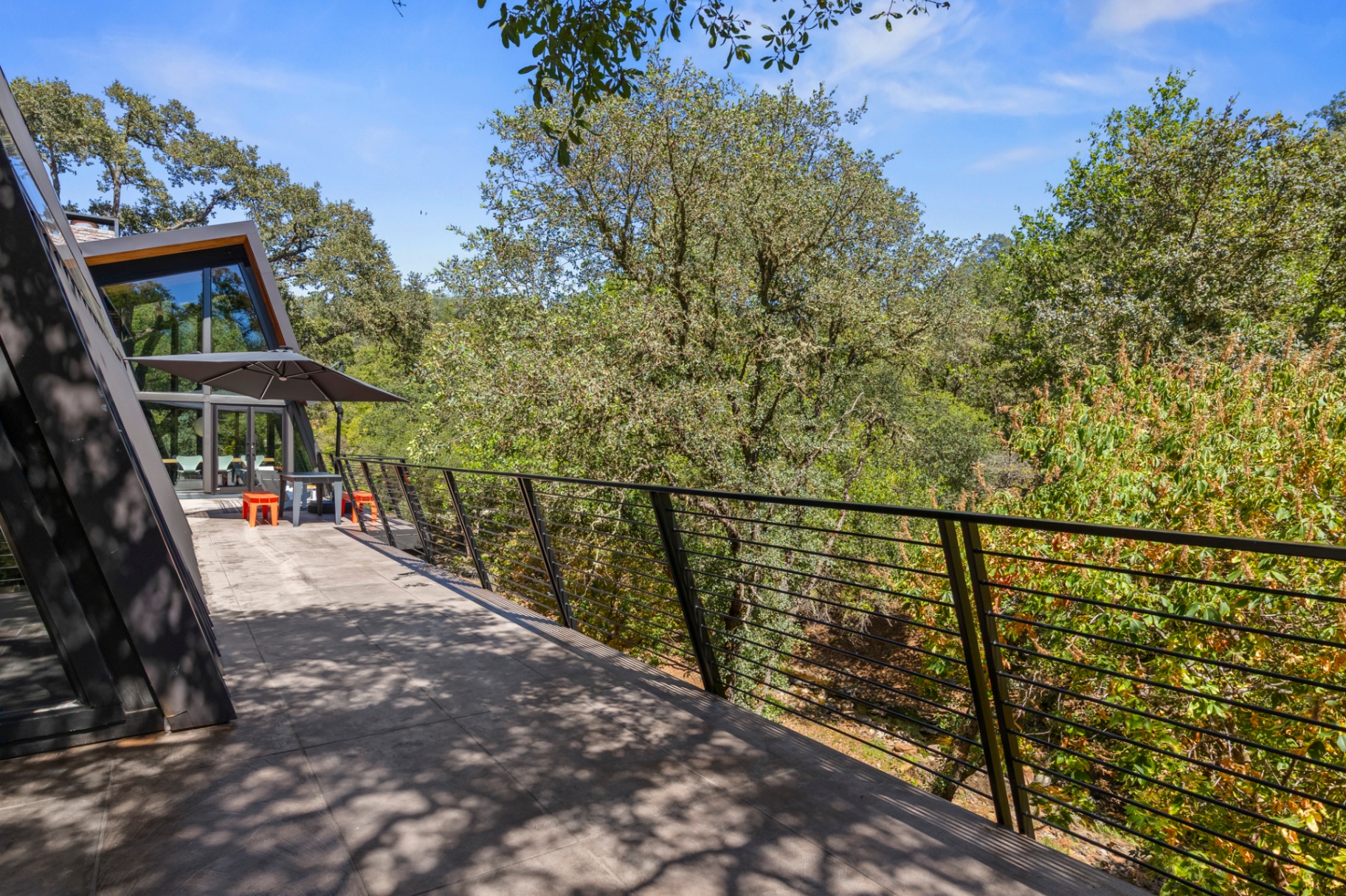 Cantilevered deck with cable railings